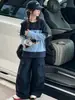 Conjunto de sudadera de retazos estilo coreano con dibujos animados y overol para niñas, versátil capa base de manga larga