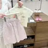 Conjunto de Dibujos Animados para Niñas 2026 Verano Nuevo Moda Camiseta Infantil con Estampado de Dibujos Animados Manga Corta Lunares Conjunto de Dos Piezas Tendencia