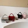 Bolsa de mão pequena super popular para mulheres, nova moda primavera 2026, bolsa de ombro versátil, bolsa quadrada pequena transversal