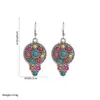 Os novos brincos longos com pingente de turquesa da Heming Jewelry são brincos de estilo étnico com um design único e apelo versátil