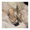 Zapatos de tacón alto para mujer, tacón fino, de una tira, tacón de cristal transparente, zapatillas de verano para mujer, nuevo estilo coreano, sandalias de strass con temperamento para mujer