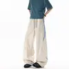 Novos Calças Casuais Streetwear Masculinas Estilo Montanha Verão 2026 com Painéis Vazados Desconstruídos e Pernas Largas Laterais