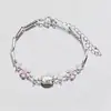 2026 Nuevo Popular Pulsera de Flor de Glicina Sonriente para Mujer, Lujo Ligero Nicho Exquisito Cristal Pulsera de Gama Alta Regalo para Mejor Amiga