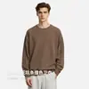 Sudadera de punto con cuello redondo, bloques de color texturizados y paneles laterales para hombre, Nueva moda Otoño 2026 Marca de moda Suéter de punto