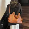 Bolsa de ombro vintage popular para comércio exterior, nova bolsa tote de grande capacidade para cross-border, bolsa de mão e bolsa transversal versátil para o dia a dia