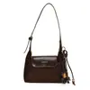 Bolso de axila de alta gama estilo vintage, bolso cruzado de un solo hombro para mujer, bolso versátil de moda minimalista urbano para el día a día, bolso vintage texturizado