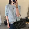 Top de Punto Calado Jacquard Europeo de Manga Corta para Mujer 2026 Verano Nuevo Único y Elegante Camiseta de Nicho