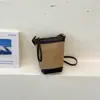 Bolso Cubo de Diseñador de Nicho Transfronterizo con Retazos de Gamuza para Mujer 2026 Otoño/Invierno Nuevo Elegante Versátil de Hombro Cruzado