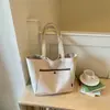 Elegante Casa de Arroz Estilo Casual Simple Lona Bolsa Grande Mujer 2026 Nuevo de Moda Gran Capacidad ins Hombro Único Bolso de Mano para Viajar