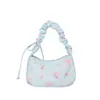 Bolsa de Lona Floral Suave e Doce para Mulheres 2026 Nova Bolsa de Ombro Única com Cordão Alto Valor Estético Estampa Floral Pequena Nó de Laço Bolsa de Axila