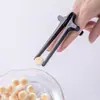 Palillos para los dedos para jugar, palillos para los dedos que no ensucian, fundas para los dedos, pinzas para alimentos, gadget para comer snacks, palillos auxiliares, soporte para palillos