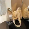 Bolsa de Couro Macio Estilo Preguiçoso Tendência deste Ano para Mulheres Novo Modelo Primavera/Verão 2026 Bolsa de Ombro Único Transversal Bolsa Tote de Grande Capacidade Leve