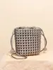 Bolso Tejido Nuevo con Calados Diseño de Nicho Bolso Cubo de Gama Alta Bolso Cruzado de PU Nudo de Molino de Viento Textura Bolso para Teléfono Móvil