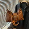 Bolso de hombro tipo tote de nicho estilo coreano para mujer, nueva colección otoño 2026, bolso de motocicleta de alta gama, bolso cruzado para el día a día