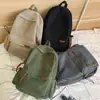 Mochila escolar de gran capacidad estilo bosque para mujeres estudiantes universitarias mochila simple de color sólido de pana japonesa estudiantes de secundaria mochila de viaje