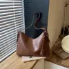 Bolsa Tote Vintage Grande Capacidade para o Trabalho 2026 Outono Inicial Nova Bolsa de Ombro Casual Fashionable de Alto Valor Tendência