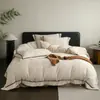 2026 Nuevo Conjunto de Cuatro Piezas Estilo Cinta Tejida de Felpa de Leche Jacquard Grande CloudSleep