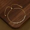 Pulsera de cordón ajustable con baño de oro real, nuevo para otoño e invierno, pulsera de lazo con circonita de alto sentido para mujer, fábrica de origen