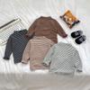 Camiseta interior de base a rayas para bebé Otoño e Invierno Ropa nueva para bebé Estilo coreano Versátil Camiseta de manga larga Top de cuello alto
