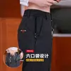 Calças Casuais Versáteis Masculinas com Zíper e Múltiplos Bolsos para Atacado Transfronteiriço, Estilo Fino Novo para Primavera e Outono, Calças Retas Largas Masculinas de Negócios