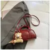 2026 Nuevo Modelo Bolso de Hombro Texturizado de Color Sólido de Moda Elegante para Mujer Bolso Boston de Moda Bolso Cruzado de Moda