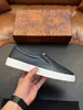 Mocasines populares de cuero genuino estilo de negocios, zapatos casuales tipo slip-on con patrón de lichi, suministro transfronterizo
