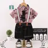 Traje de Verano para Niños de Manga Corta Nueva Llegada Moda de Verano Atractivo Celebridad Cibernética Calle Frita Pantalones Cortos con Correa de Lazo en Relieve traje