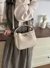 Bolso de mano de diseño nicho estilo coreano para mujer 2026 nuevo diseño transfronterizo bolso madre-hija bolso de hombro cruzado PU
