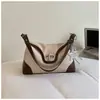 Bolso hobo transfronterizo nuevo de alto valor nicho Bolso de hombro único color-block retro francés de gran capacidad para el trabajo y el commute para mujer