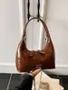 Bolso de Mano Yuezi de Nicho Bolso Dumpling para Mujer Nuevo Primavera 2026 Bolso de Hombro Cruzado Elegante y Único