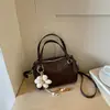 Bolso tipo almohada minimalista de alta costura Shuai Mi Jia para mujer, nuevo y elegante bolso cruzado 2026, versión coreana de nicho, bolso de hombro de moda