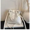 Bolsa de Corrente Simples Estilo Balde para Mulheres, Novo Design de Moda Transfronteiriço, Bolsa de Ombro Transversal de Grande Capacidade Estilo Saco de Lixo, Tendência