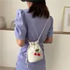 Bolsa Pequeña de Verano 2020 Nuevo Estilo Bolso Cruzado para Estudiantes Mujeres Estilo Ins Bolso Artístico de Lona Bolso Cubo de un Solo Hombro Moderno