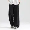 Pantalones casuales rectos de color liso de moda para hombres y mujeres, nueva moda de verano, versátiles, holgados, transpirables, de secado rápido, largos