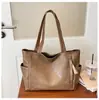 Bolsa de ombro feminina estilo coreano em couro PU macio, nova moda 2025, bolsa tote de grande capacidade, versátil para o dia a dia