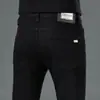 Pantalones vaqueros de marca de alta gama y tendencia de Hong Kong para primavera y otoño, pantalones ajustados elásticos negros bordados, pantalones casuales estilo coreano