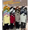 Yuanxi - Estilo Coreano de Otoño Estilo Sencillo y Suave Diseño Hueco Flocado Engrosado Cuello Alto Manga Larga Camisa Base 263351