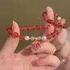 Novo estilo chinês leve estilo de luxo vermelho folha de bordo frisado pulseira nicho design high-end estilo requintado personalizado joias de mão atacado