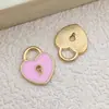 Set Mixto de 30 Colgantes Nuevos de Aleación de Esmalte con Forma de Corazón Hueco y Flor de Rosa de Colores Accesorios para Llaveros de Joyería DIY