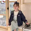 Jaqueta de Outono para Meninas 2026 Novo Estilo para Crianças Médias e Mais Velhas Cardigan Xadrez com Capuz e Desenho Peça de Roupa Externa Estilosa e Versátil