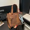 Elegante bolso de mano tipo cubo bandolera para mujer, color liso, nuevo de verano 2026, estilo coreano, moderno, con colgante de estrella