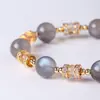 Pulsera de Perlas de Piedra Lunar Plata Natural, Moda de Lujo Ligero con un Toque de Alta Gama, Separador de Cristal Torre Amarilla, Joyería de Pulsera Elegante