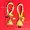 Pingente de chaveiro em formato de zongzi de gato KT fofo de desenho animado em ouro puro, alça para celular, presente corporativo, atacado personalizado