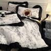 Juego de cama de algodón de estilo Hepburn francés vintage de cuatro piezas Algodón 2025 Nuevo estilo Encaje Funda de edredón Sábana Bajera Colchón