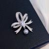 Anel de flor de borboleta de inverno novo elemento tian ran broche de pérola de água doce corsage fashion broche de terno combinado