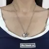 Joyería de moda Plata tailandesa Retro Corazón de doble melocotón Collar de tumba Cadena de suéter Otoño e Invierno Personalizado de Europa y América Cruz de Alta Gama