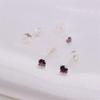 Pendientes de cuatro garras de plata esterlina S925 con explosiones transfronterizas entre Europa y Estados Unidos, joyería de oreja masculina y femenina de piedra roja Joker de moda al por mayor