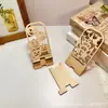 Ornatos de Mesa de Abóbora de Halloween Criativos Transfronteiriços Suporte de Exibição de Celular Oco de Madeira Suportes Preguiçosos Ornatos