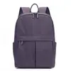 Mochila de viaje, para ir al trabajo y para la escuela de diseño minimalista, tela de nailon, impermeable, versátil, moderna, mochila para mujer de estilo simple