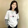 Camiseta de manga larga de dibujos animados para niña, prenda interior de otoño, nuevo modelo 2026, camiseta básica de algodón puro de dos piezas simuladas para niños talla mediana y grande